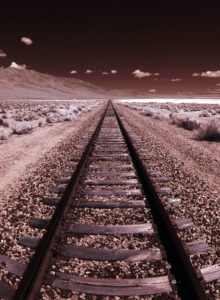 Railroad Tracks to Horizon on a Salt Flat